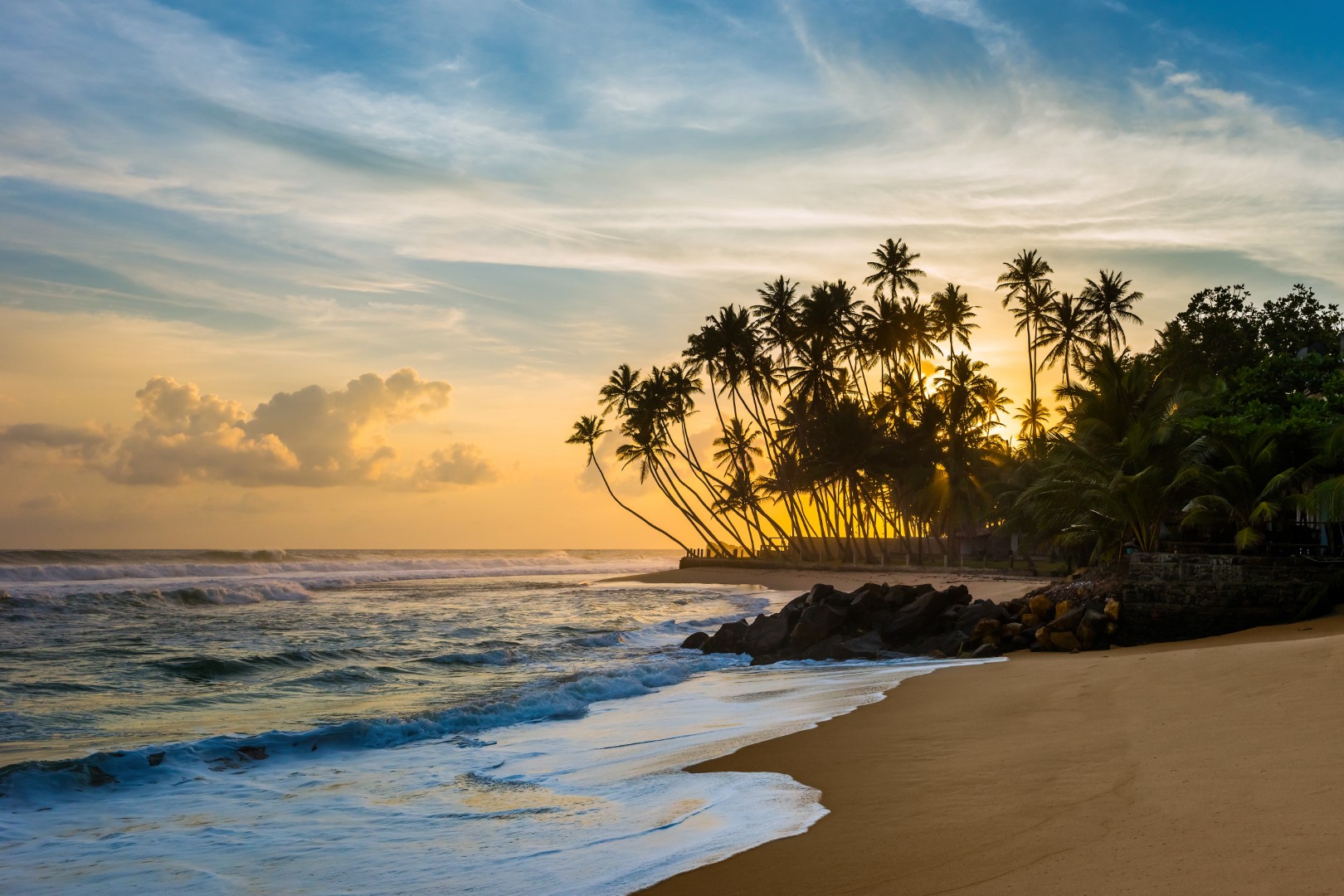 Beautiful,Tropical,Sunset,With,Palm,Trees.,Wijaya,Beach,,Sri,Lanka